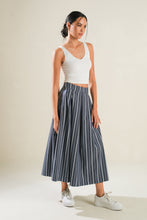 Load image into Gallery viewer, BEHIND THE GRIN WOVEN MIDI SKIRT
