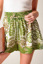 Load image into Gallery viewer, DISTANT ECHOES GREEN SHORTS
